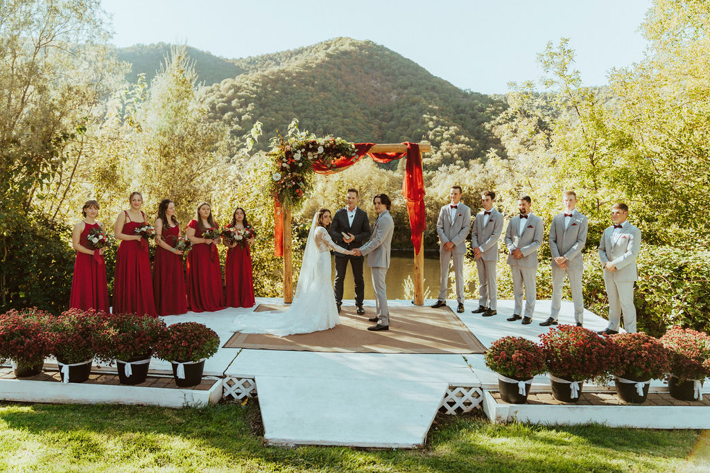 Outdoor fall riverside Oregon wedding ceremony
