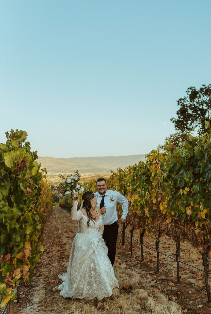 bride and groom celebrating marriage in vineyards