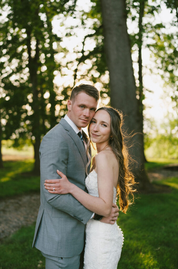 bride and groom portraits in their outdoor wedding